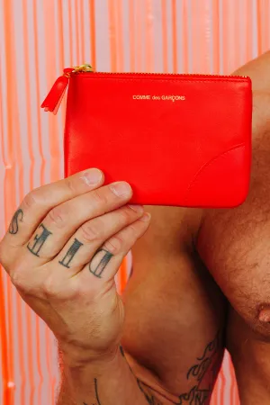 COMME DES GARÇONS SMALL POUCH ORANGE